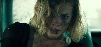 Movie still from “Don't Breathe” (2016), directed by Fede Alvarez – A person with makeup on her face; Close Up shot, Low angle