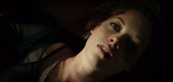 Movie still from “Don't Breathe” (2016), directed by Fede Alvarez – A person laying on the ground; Close Up shot, Overhead angle