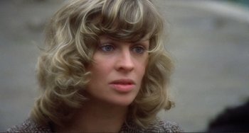 Movie still from “Don't Look Now” (1973), directed by Nicolas Roeg – A person wearing a sweater; Close Up shot, High angle