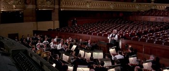 Movie still from “La Grande Vadrouille” (1966), directed by Gérard Oury – A large group of people sitting in a large auditorium; Extreme Wide shot, High angle