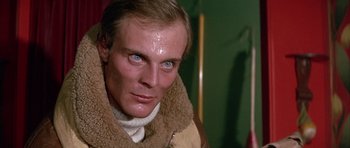 Movie still from “La Grande Vadrouille” (1966), directed by Gérard Oury – A person wearing a jacket; Close Up shot, Low angle