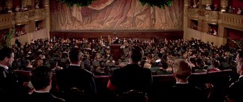 Movie still from “La Grande Vadrouille” (1966), directed by Gérard Oury – A crowd of people sitting in front of an audience; Extreme Wide shot, High angle
