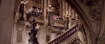 Movie still from “La Grande Vadrouille” (1966), directed by Gérard Oury – A group of people standing on the steps of a building; Extreme Wide shot, High angle