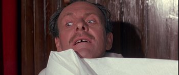 Movie still from “La Grande Vadrouille” (1966), directed by Gérard Oury – An old man with an angry look on his face; Close Up shot, Low angle