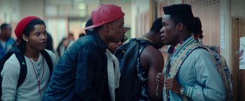 Movie still from “Dope” (2015), directed by Rick Famuyiwa – A group of young men standing next to each other; Close Up shot, Over the shoulder angle