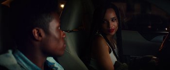 Movie still from “Dope” (2015), directed by Rick Famuyiwa – A woman sitting next to a man in the back of a car; Close Up shot, Over the shoulder angle