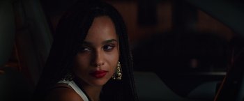 Movie still from “Dope” (2015), directed by Rick Famuyiwa – A person with long black hair; Close Up shot, Over the shoulder angle
