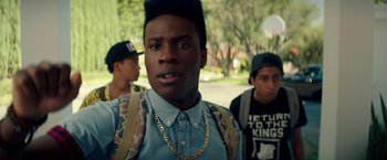 Movie still from “Dope” (2015), directed by Rick Famuyiwa – A group of young men standing next to each other on a field; Close Up shot, Over the shoulder angle