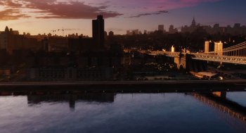Movie still from “Doubt” (2008), directed by John Patrick Shanley – A view of a city skyline at sunset; Extreme Wide shot, High angle