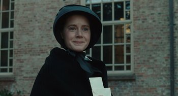 Movie still from “Doubt” (2008), directed by John Patrick Shanley – A woman wearing a hat and holding a paper; Close Up shot, Low angle