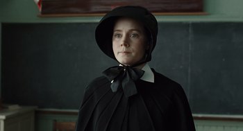 Movie still from “Doubt” (2008), directed by John Patrick Shanley – A woman wearing a black dress and a black hat; Close Up shot, Low angle
