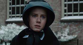 Movie still from “Doubt” (2008), directed by John Patrick Shanley – A woman wearing a black hat and a black cape; Close Up shot, Low angle