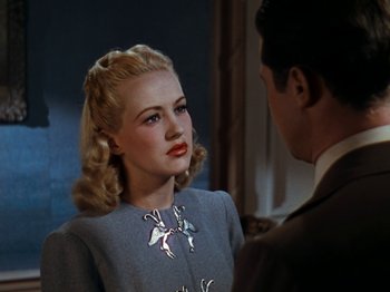 Movie still from “Down Argentine Way” (1940), directed by Irving Cummings – A man and a woman are talking to each other; Close Up shot, Over the shoulder angle