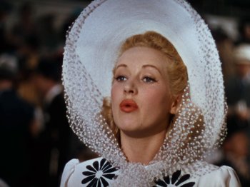 Movie still from “Down Argentine Way” (1940), directed by Irving Cummings – A person wearing a hat; Close Up shot, Low angle