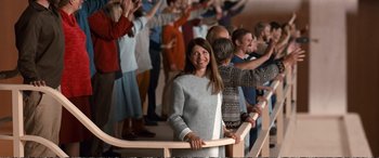 Movie still from “Downsizing” (2017), directed by Alexander Payne – A group of people standing in front of each other; Wide shot, High angle