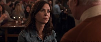 Movie still from “Downsizing” (2017), directed by Alexander Payne – A person wearing a jean jacket; Close Up shot, Over the shoulder angle