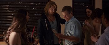 Movie still from “Downsizing” (2017), directed by Alexander Payne – A man and a woman standing next to each other; Medium shot, Over the shoulder angle