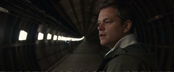 Movie still from “Downsizing” (2017), directed by Alexander Payne – A person standing in a tunnel; Close Up shot, Low angle