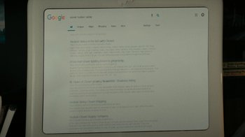 Movie still from “Dr. Bird's Advice for Sad Poets” (2021), directed by Yaniv Raz – A computer screen showing a page of a google site; Extreme Close Up shot, Over the shoulder angle