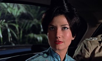 Movie still from “Dr. No” (1962), directed by Terence Young – A person in a car; Close Up shot, Low angle