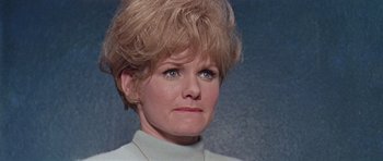 Movie still from “Dr. Who and the Daleks” (1965), directed by Gordon Flemyng – A person wearing a white shirt; Close Up shot, Low angle