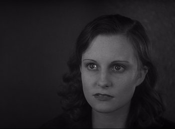Movie still from “Dracula” (1931), directed by Tod Browning – A black and white photo of a woman's face; Close Up shot, High angle