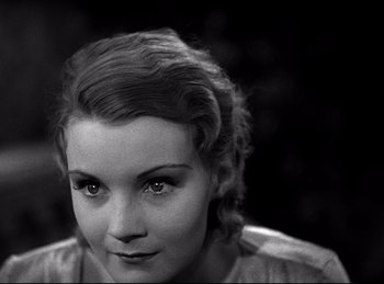 Movie still from “Dracula” (1931), directed by Tod Browning – A black and white photo of a woman's face; Close Up shot, High angle