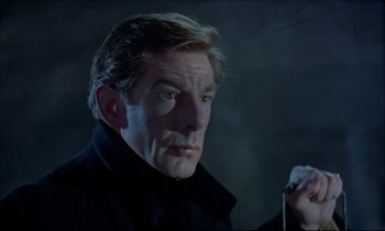 Movie still from “Horror of Dracula” (1958), directed by Terence Fisher – A person wearing a black jacket; Close Up shot, Low angle