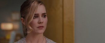 Movie still from “Drag Me to Hell” (2009), directed by Sam Raimi – A person wearing a necklace; Close Up shot, Over the shoulder angle