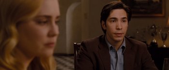 Movie still from “Drag Me to Hell” (2009), directed by Sam Raimi – A man and a woman sitting at a table in front of a mirror; Close Up shot, Over the shoulder angle