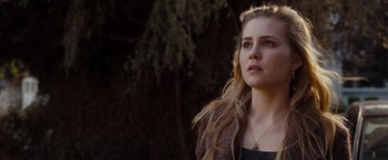 Movie still from “Drag Me to Hell” (2009), directed by Sam Raimi – A woman with long blonde hair wearing a brown jacket; Close Up shot, Low angle