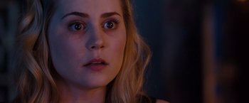 Movie still from “Drag Me to Hell” (2009), directed by Sam Raimi – A person looking at the camera; Close Up shot, Over the shoulder angle