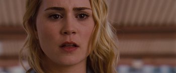 Movie still from “Drag Me to Hell” (2009), directed by Sam Raimi – A woman's face as she stares into the distance; Close Up shot, Over the shoulder angle
