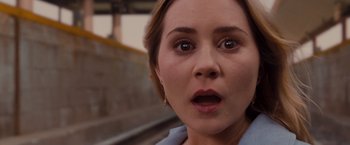 Movie still from “Drag Me to Hell” (2009), directed by Sam Raimi – A woman's face as she stares into the distance; Close Up shot, Low angle