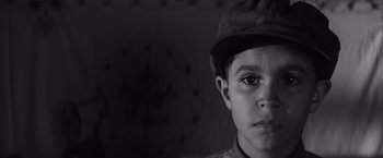 Movie still from “The Painted Bird” (2019), directed by Václav Marhoul – Close Up shot, High angle