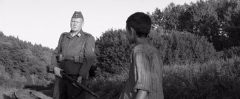 Movie still from “The Painted Bird” (2019), directed by Václav Marhoul – Medium shot, Over the shoulder angle