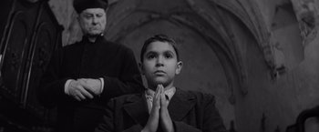 Movie still from “The Painted Bird” (2019), directed by Václav Marhoul – Medium shot, Low angle