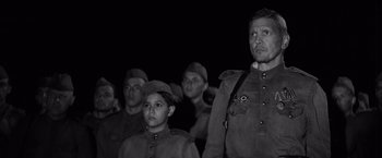 Movie still from “The Painted Bird” (2019), directed by Václav Marhoul – Medium shot, Low angle