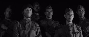 Movie still from “The Painted Bird” (2019), directed by Václav Marhoul – Medium shot, Low angle