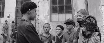 Movie still from “The Painted Bird” (2019), directed by Václav Marhoul – Medium shot, Over the shoulder angle