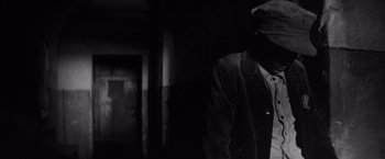 Movie still from “The Painted Bird” (2019), directed by Václav Marhoul – Medium shot, Low angle