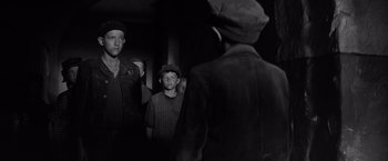 Movie still from “The Painted Bird” (2019), directed by Václav Marhoul – Medium shot, Low angle