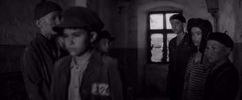 Movie still from “The Painted Bird” (2019), directed by Václav Marhoul – Medium shot, Over the shoulder angle