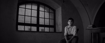 Movie still from “The Painted Bird” (2019), directed by Václav Marhoul – Medium shot, Low angle