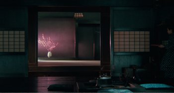 Movie still from “Dreams” (1990), directed by Akira Kurosawa – A vase of flowers in front of an open window; Extreme Wide shot, High angle