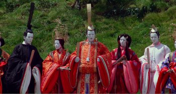 Movie still from “Dreams” (1990), directed by Akira Kurosawa – A group of people dressed up in traditional costumes; Extreme Wide shot, High angle