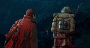 Movie still from “Dreams” (1990), directed by Akira Kurosawa – Two men in red jackets are looking at the moon; Medium shot, Low angle