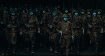 Movie still from “Dreams” (1990), directed by Akira Kurosawa – A group of men in military uniforms are marching; Wide shot, High angle