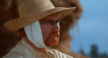 Movie still from “Dreams” (1990), directed by Akira Kurosawa – A person wearing a hat; Close Up shot, Low angle