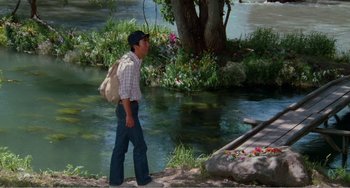 Movie still from “Dreams” (1990), directed by Akira Kurosawa – A man walking near a body of water; Wide shot, High angle